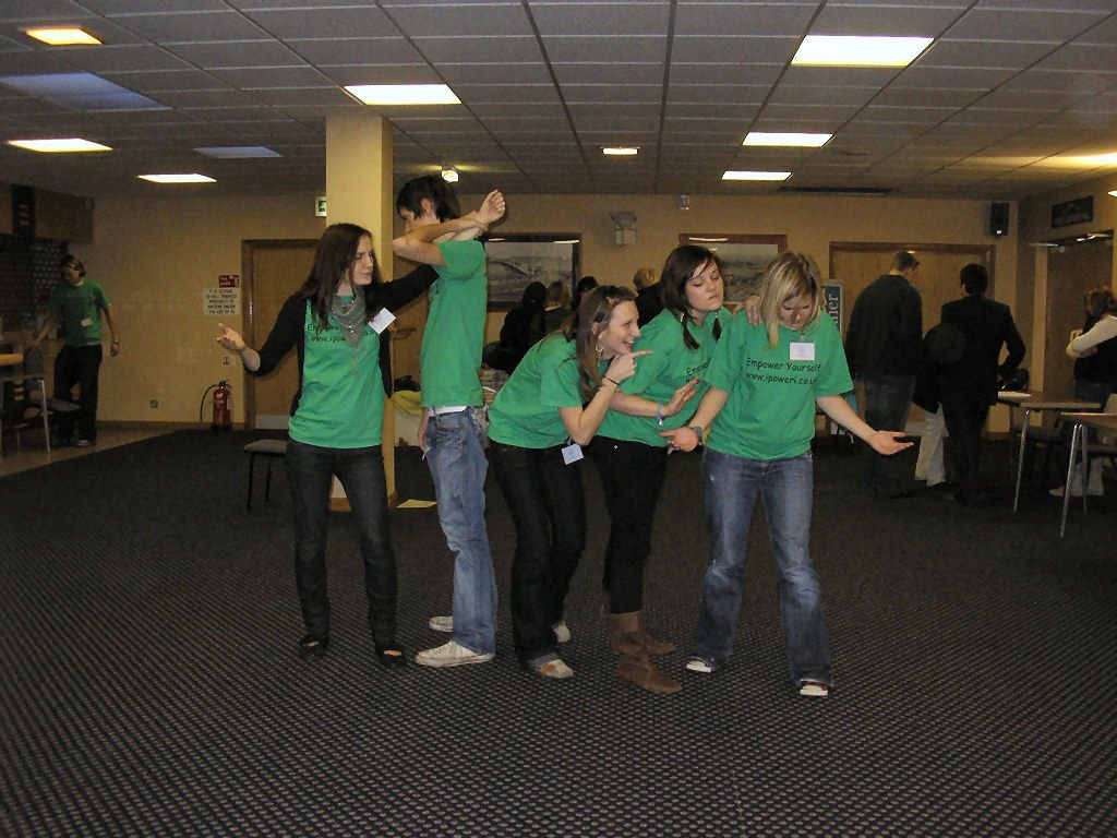 Young people creating a physical freeze-frame together