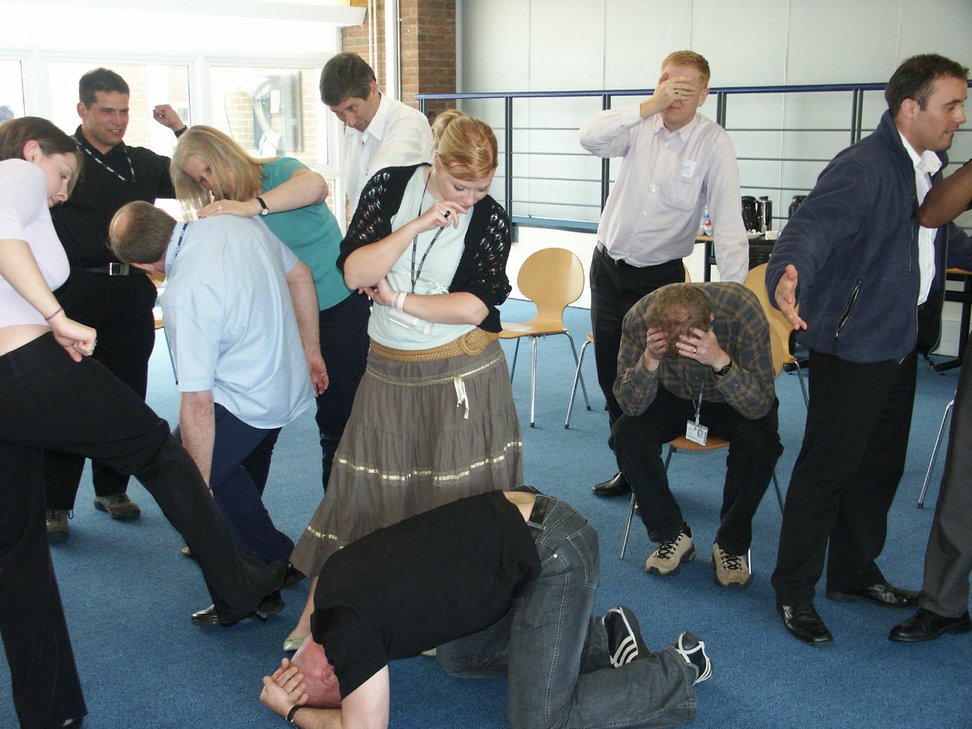 Adults taking part in an active staff training workshop